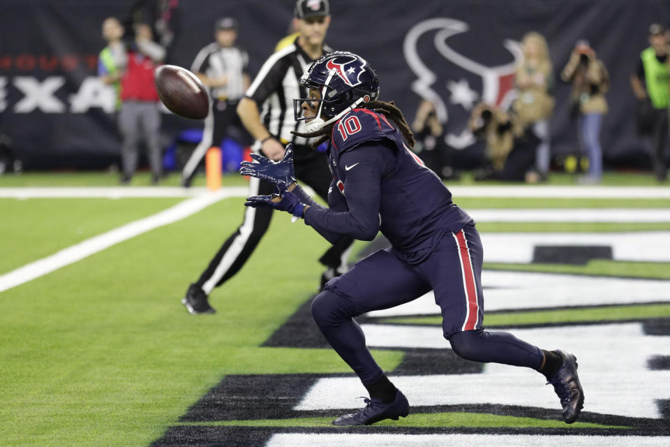 Houston Texans wide receiver DeAndre Hopkins (10) makes a catch for a touchdown against the Indianapolis Colts during the first half of an NFL football game Thursday, Nov. 21, 2019, in Houston. (AP Photo/Mike Marshall)