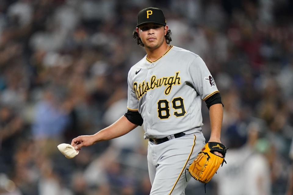 Pittsburgh Pirates' Miguel Yajure holds the rosin bag after New York Yankees' Gleyber Torres hit a home run during the eighth inning of a baseball game Wednesday, Sept. 21, 2022, in New York. The Yankees won 14-2. (AP Photo/Frank Franklin II)