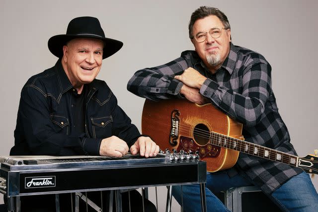 <p>John Shearer</p> Paul Franklin and Vince Gill