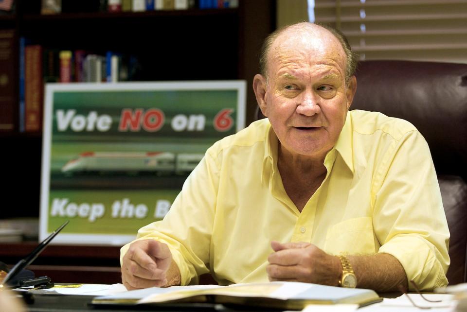 C.C. "Doc" Dockery, bullet train advocate , talks about obstacles that the proposed high-speed rail has endured in his office in Lakeland on Oct. 15, 2004.
