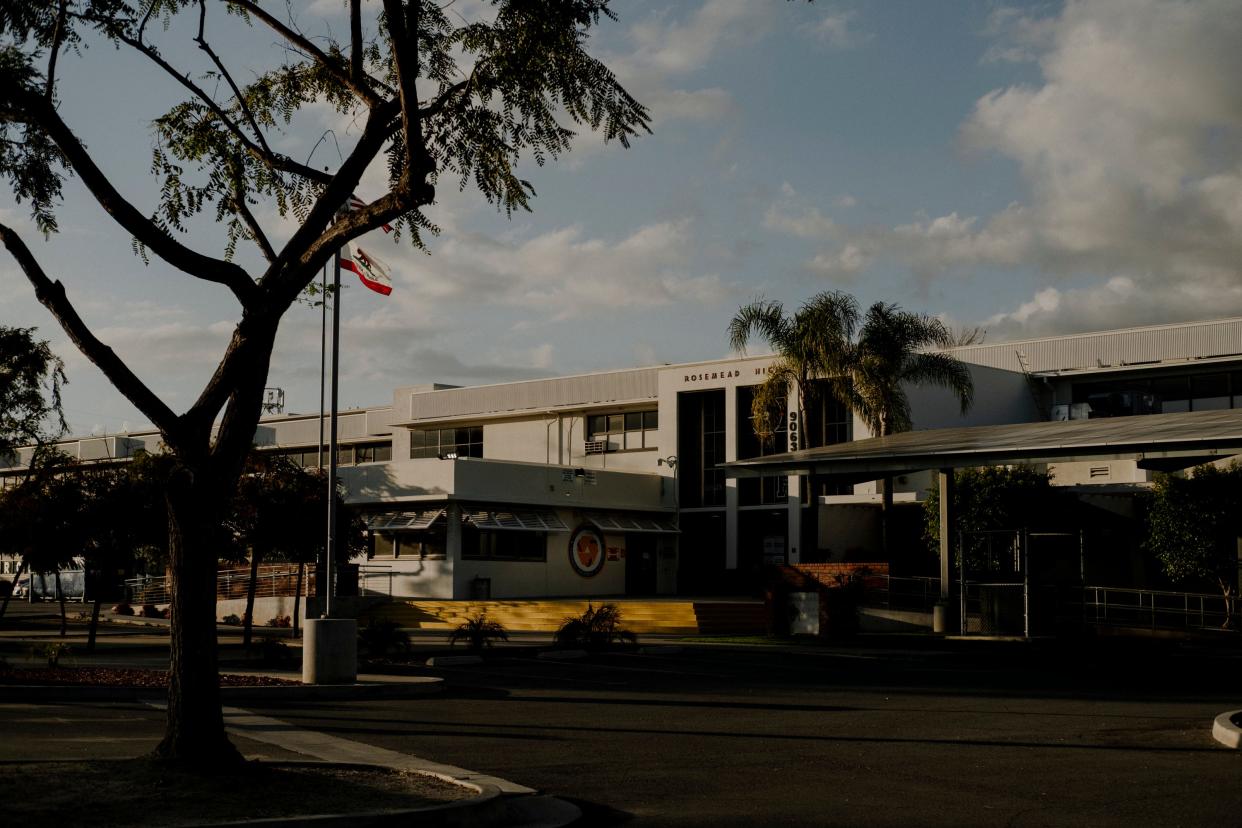 The exterior of Rosemead High School, with a tree in the foreground.