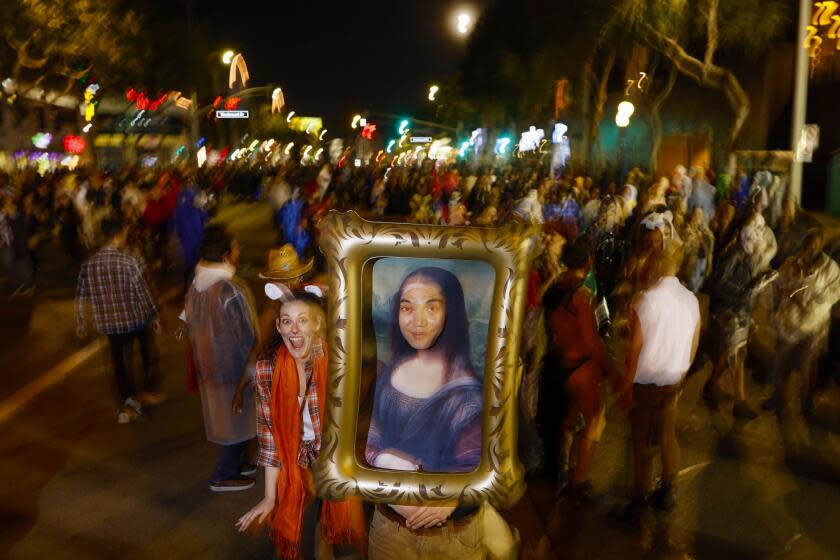 West Hollywood, CA, Tuesday, October 31, 2023 - Kevin Phan is a piece of art as he walks along Santa Monica Blvd. along with thousands of other people at the West Hollywood Halloween Carnaval. (Robert Gauthier/Los Angeles Times)