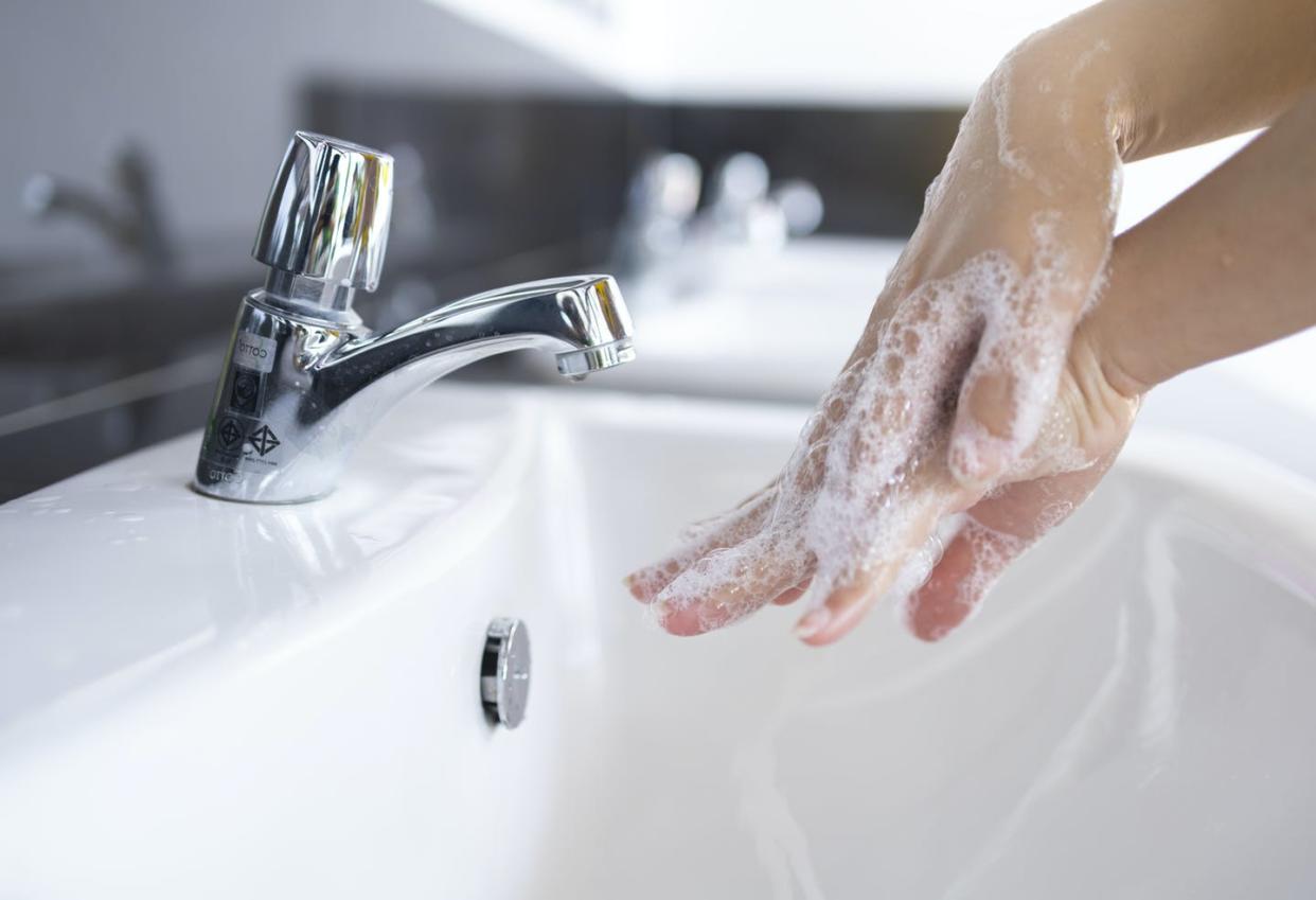 <span class="caption">Washing your hands is an easy and effective way to reduce the spread of illness.</span> <span class="attribution"><a class="link " href="https://www.gettyimages.com/detail/photo/hygiene-cleaning-hands-washing-hands-wash-hands-royalty-free-image/1216510830?adppopup=true" rel="nofollow noopener" target="_blank" data-ylk="slk:Krisanapong Detraphiphat/Moment via Getty Images;elm:context_link;itc:0;sec:content-canvas"> Krisanapong Detraphiphat/Moment via Getty Images</a></span>