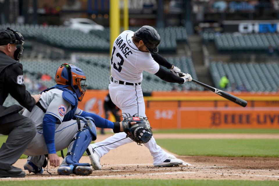 Detroit Tigers designated hitter Eric Haase (13) hits a three-run home run off New York Mets starting pitcher Joey Lucchesi (47) (not pictured) in the first inning at Comerica Park in Detroit on Wednesday, May 3, 2023.