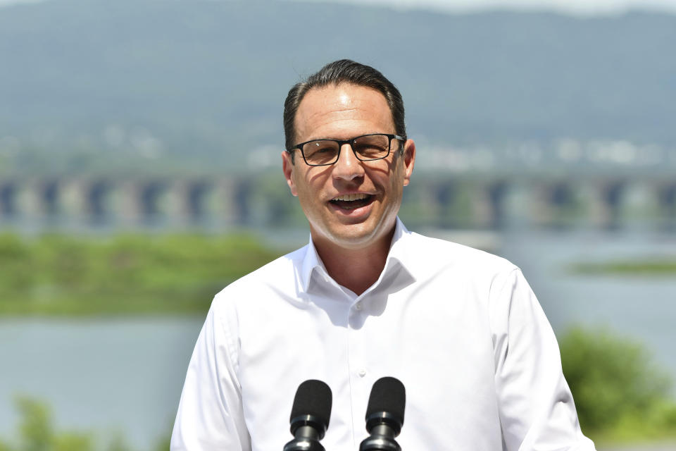 Pennsylvania Gov. Josh Shapiro speaks during a news conference overlooking the Susquehanna River from a balcony at the offices of the Susquehanna River Basin Commission, Tuesday, July 9, 2024, in Harrisburg, Pa. (AP Photo/Marc Levy)