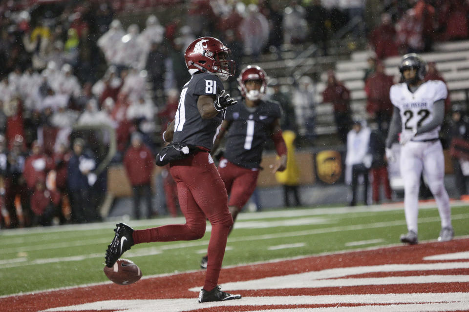 Washington State wide receiver Renard Bell (81) celebrates his touchdown catch during the second half of an NCAA college football game against Colorado in Pullman, Wash., Saturday, Oct. 21, 2017. Washington State won 28-0. (AP Photo/Young Kwak)