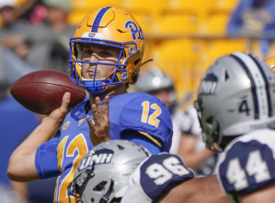 FILE - Pittsburgh quarterback Nick Patti (12) passes as New Hampshire defensive end Josiah Silver (96) and defensive back Noah Palm (44) defend during the second half of an NCAA college football game on Sept. 25, 2021, in Pittsburgh. Patti is expected to start in the Sun Bowl on Friday, Dec. 30, 2022, after Kedon Slovis transferred to BYU. The same thing happened last season, on the bigger stage of the Peach Bowl, after Kenny Pickett declared for the NFL draft. (AP Photo/Keith Srakocic, File)