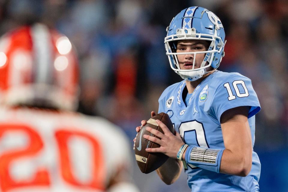 North Carolina quarterback Drake Maye (10) looks to pass in the first half of the Dec. 3 Atlantic Coast Conference championship NCAA college football game against Clemson in Charlotte, N.C.