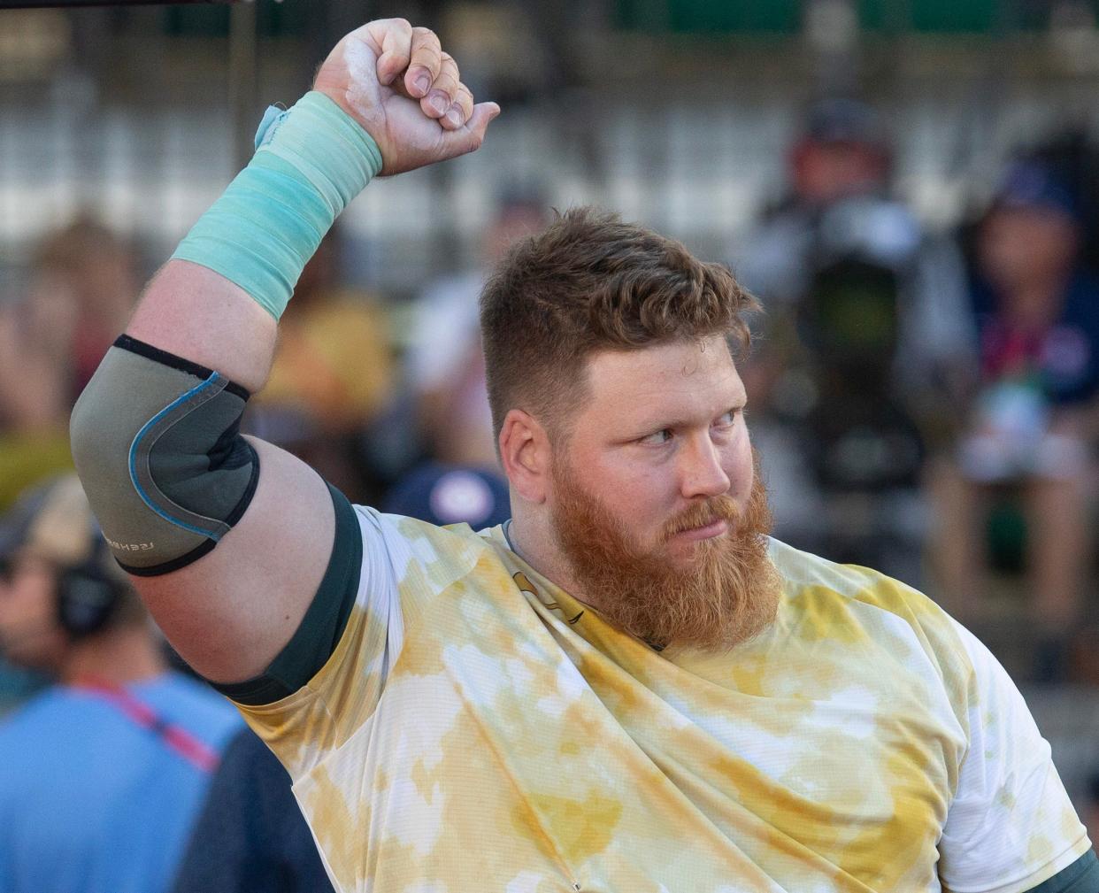 Ryan Crouser celebrates a big throw during the men’s shot put on day 2 of the U.S. Olympic Trials at Hayward Field in Eugene June 22.