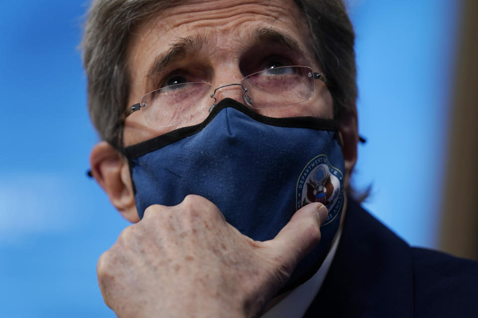 Special Presidential Envoy for Climate John Kerry listens during the virtual Leaders Summit on Climate, from the East Room of the White House, Thursday, April 22, 2021, in Washington. (AP Photo/Evan Vucci)