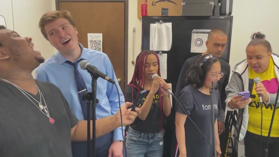 Students making music at a practice session with Jazz Hands for Autism. (KTLA)