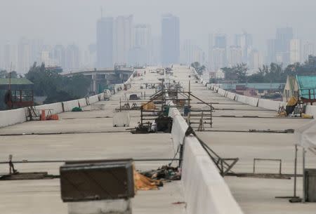 A newly dried concrete and secure linking steel bars of the 5.58 kilometre elevated highway is seen in Caloocan City, metro Manila, Philippines on August 2, 2017. REUTERS/Romeo Ranoco