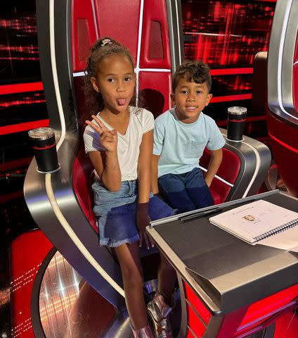 <p>John legend/Instagram</p> John Legend shared a photo of his children Luna and Miles posing for the camera while in his judging seat.