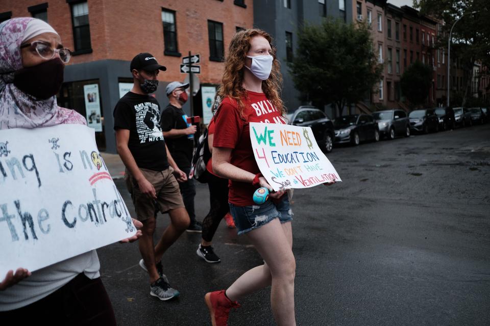 Members of the teachers union, parents and students participate in a march through Brooklyn to demand a safer teaching environment for themselves and for students during the Covid-19 pandemic on September 1, 2020 in New York City. As confusion about the start of the school year continues, New York City Mayor Bill de Blasio announced on Tuesday that the start of the school year will be delayed amid the threat of a teacher strike.