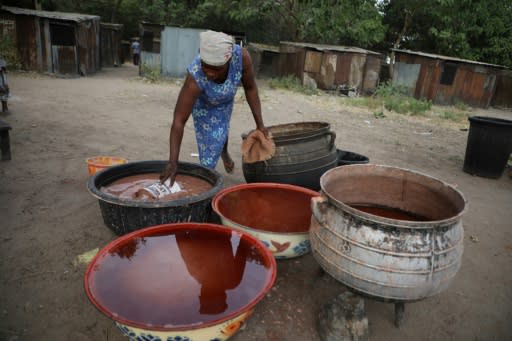 Making burukutu is a time-consuming business -- it takes three days to steep, ferment, filter, boil and refilter the brew