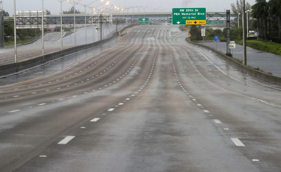 A freeway is empty as winds and rain in the outer bands of Hurricane Irma arrive in Miami.