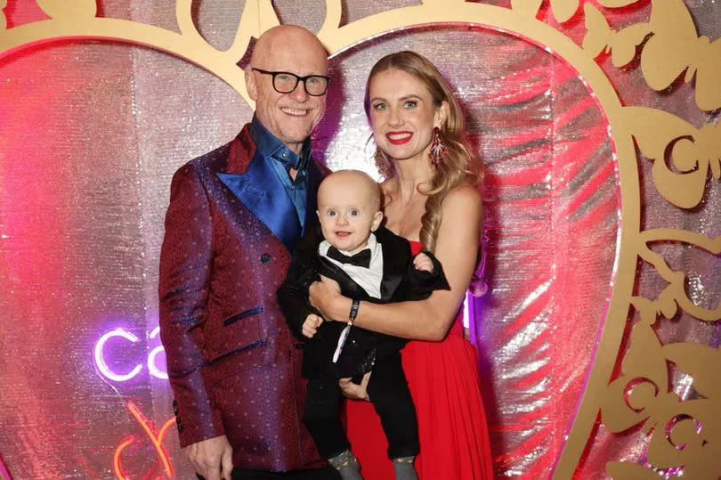 John Caudwell, Modesta Vzesniauskaite and son William -Credit: David M. Benett/Dave Benett/Getty Images