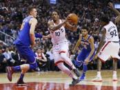 Nov 17, 2017; Toronto, Ontario, CAN; Toronto Raptors guard DeMar DeRozan (10) drives to the net against New York Knicks forward Kristaps Porzingis (6) at the Air Canada Centre. Mandatory Credit: John E. Sokolowski-USA TODAY Sports