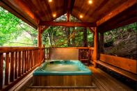 <p>Escape to the outdoor hot tub after most people are alseep. It’s covered, for shelter — and privacy. (Airbnb) </p>