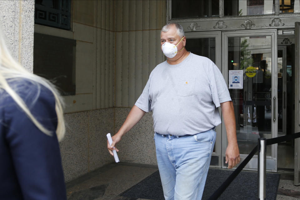 Ohio House Speaker Larry Householder leaves the federal courthouse after an initial hearing following charges against him and four others alleging a $60 million bribery scheme Tuesday, July 21, 2020, in Columbus, Ohio. (AP Photo/Jay LaPrete)