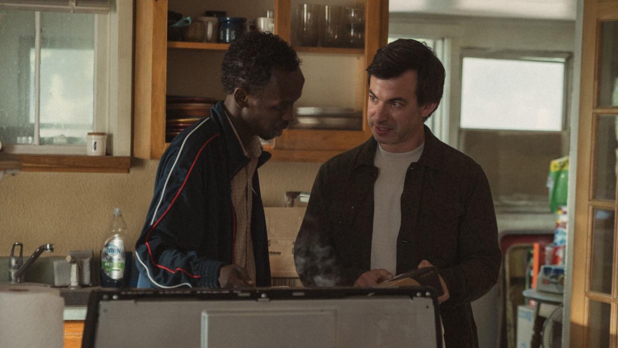  Barkhad Abdi and Nathan Fielder in The Curse. 