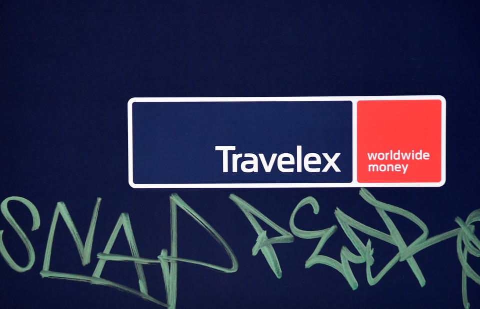 Signage with graffiti next to it is seen on a branch of Travelex Currency Exchange in London, Britain, January 8, 2020. REUTERS/Toby Melville