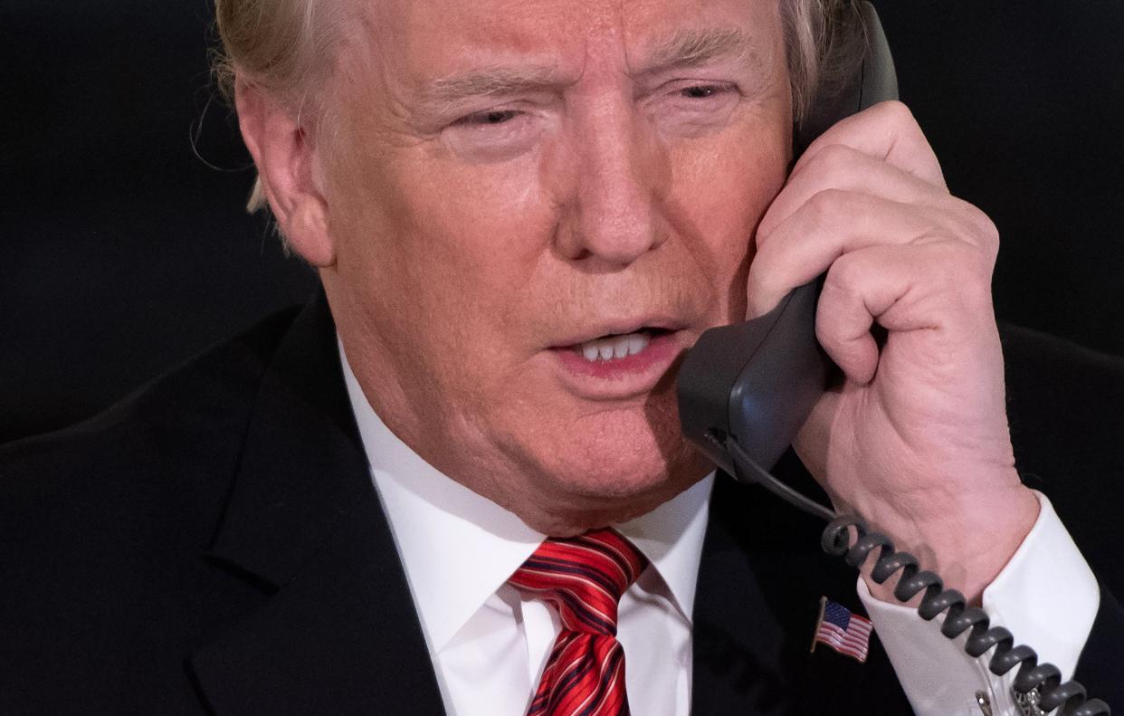 Donald Trump’s phone calls have gotten him into considerable trouble over the years. (AFP via Getty Images)