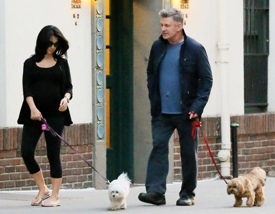 Actor Alec Baldwin and his pregnant wife Hilaria Thomas Baldwin go for a walk with their two dogs, bumping into another family in New York City