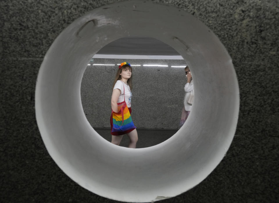 People walk towards the starting point of the Equality Parade, an LGBT pride parade, in Warsaw, Poland, Saturday, June 19, 2021.(AP Photo/Czarek Sokolowski)