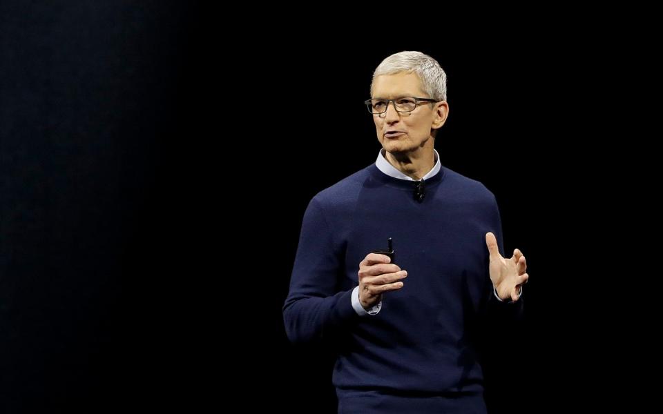 Tim Cook admitted the company could have been clearer about the issue - AP