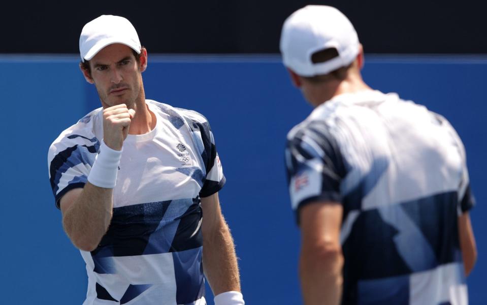 Andy Murray of Team Great Britain celebrates after a point during his Men's Doubles First Round match with Joe Salisbury of Team Great Britain against Nicolas Mahut of Team France and Pierre-Hugues Herbert of Team France on day one of the Tokyo 2020 Olympic - GETTY IMAGES