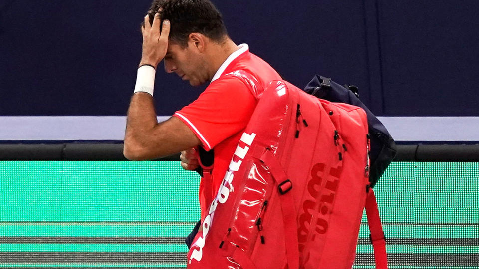 Juan Martin del Potro leaves the court after he retired. (Photo by Kevin Lee/Getty Images)