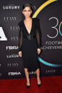 <p>Daring in a sexy black Michael Kors dress with a plunging neckline. <i>(Photo by Theo Wargo/Getty Images)</i> </p>