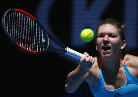 Tennis - Australian Open - Melbourne Park, Melbourne, Australia - 16/1/17 Romania's Simona Halep hits a shot during her Women's singles first round match against Shelby Rogers of the U.S. .REUTERS/Thomas Peter