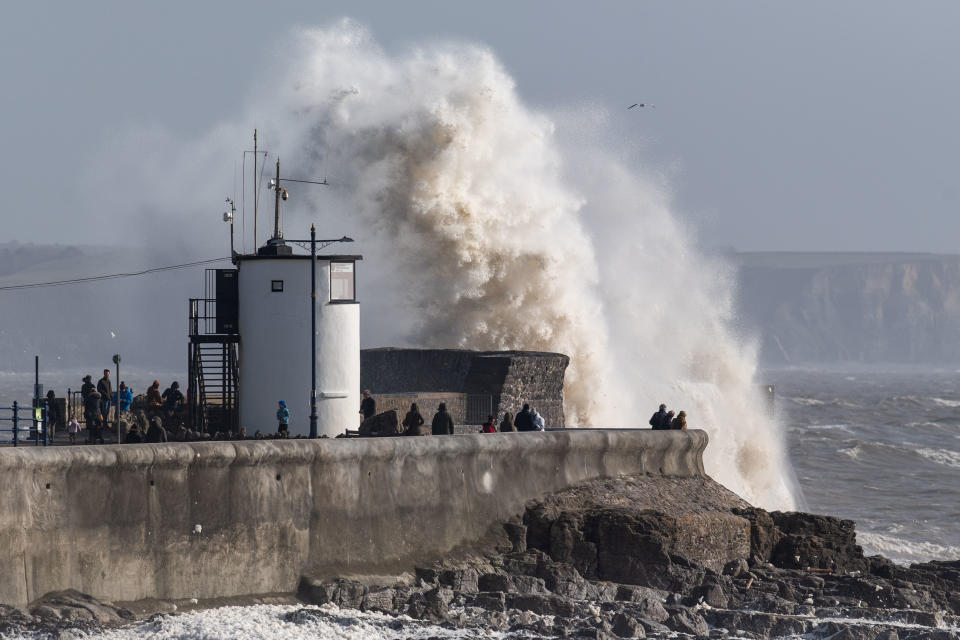 PORTHCAWL, UNITED KINGDOM - FEBRUARY 17: Waves crash against the harbour wall on February 17, 2020 in Porthcawl, United Kingdom. A major incident was declared by South Wales Police yesterday as Storm Dennis caused flooding and homes to be evacuated following a red weather warning for rain from the Met Office. Yellow weather warnings for wind and rain are in place for Monday for large parts of the UK. (Photo by Matthew Horwood/Getty Images)