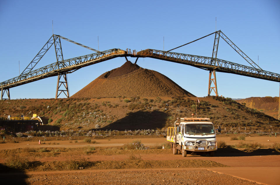 Iron ore handling plant which crushes and mixes the iron ore until the correct blend is produced.