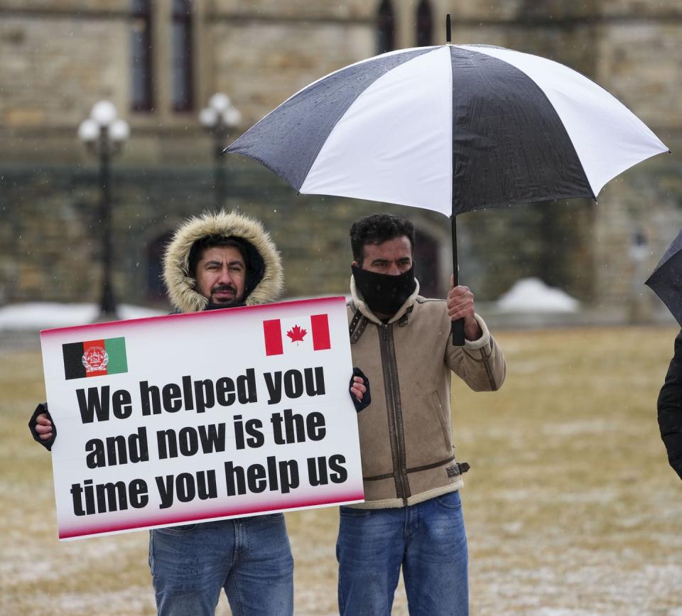 <span class="caption">Former Afghanistan interpreters protest on Parliament Hill in March 2022. The group who helped the Canadian military accused the federal government of lying to them about bringing their family members to Canada.</span> <span class="attribution"><span class="source">THE CANADIAN PRESS/Sean Kilpatrick</span></span>