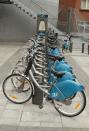 Dublin bikes are lined up at a pay point in Dublin, Ireland.