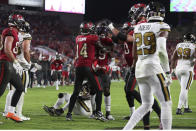 Tampa Bay Buccaneers running back Rachaad White (29) celebrates his touchdown with wide receiver Chris Godwin (14) late in the second half of an NFL football game in Tampa, Fla., Monday, Dec. 5, 2022. The Buccaneers won 17-16. (AP Photo/Mark LoMoglio)