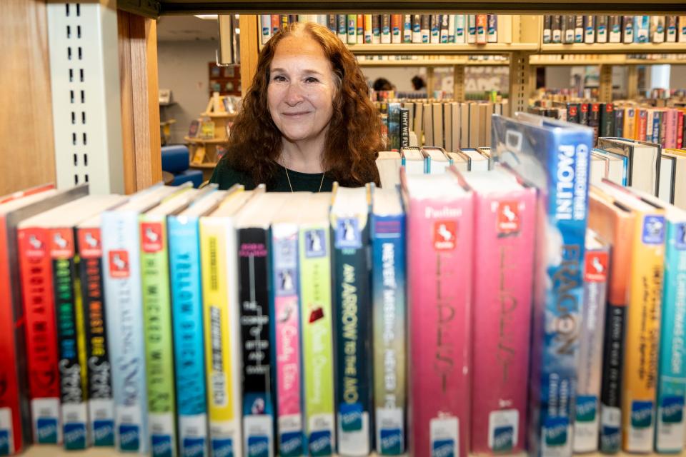 Apr 4, 2024; Fair Lawn, NJ, United States; Library Director Adele Puccio poses for a photo in the Maurice M. Pine Free Public Library. The Fair Lawn library is becoming a book sanctuary and Puccio is pledging to never ban books.