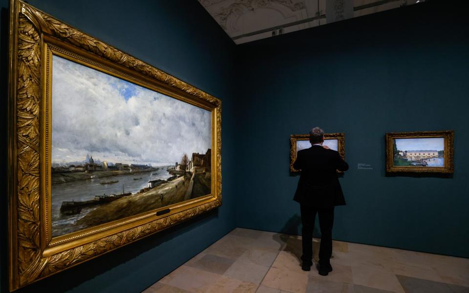 French artist Antoine Guillemet's work titled 'Bercy en decembre' is exhibited in the new exhibition of the Musee d'Orsay