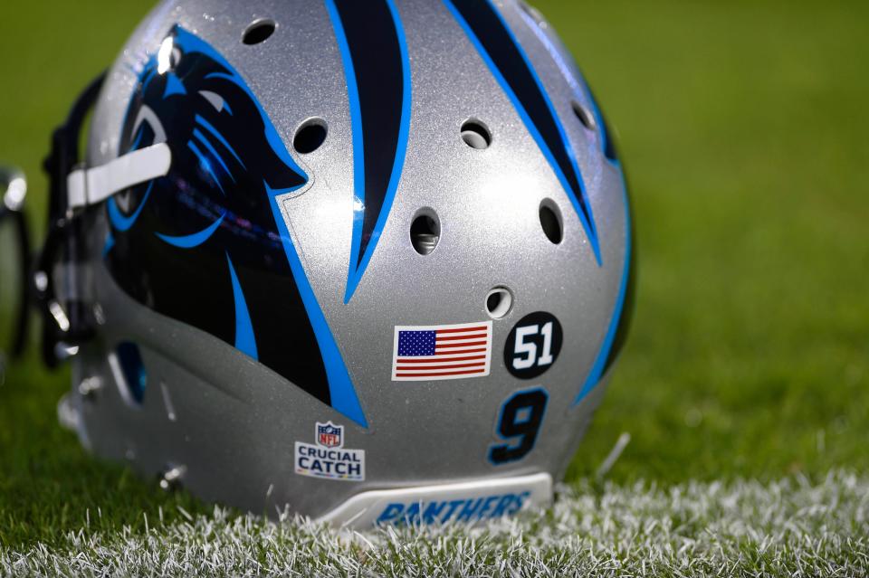 Oct 12, 2017; Charlotte, NC, USA; Carolina Panthers players wear a 51 sticker on their helmets in honor of former player Sam Mills at Bank of America Stadium. Mandatory Credit: Bob Donnan-USA TODAY Sports