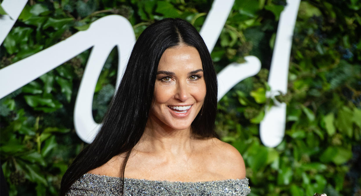 Demi Moore defied her 59 years as she posed in her new swimwear line. (Getty Images)