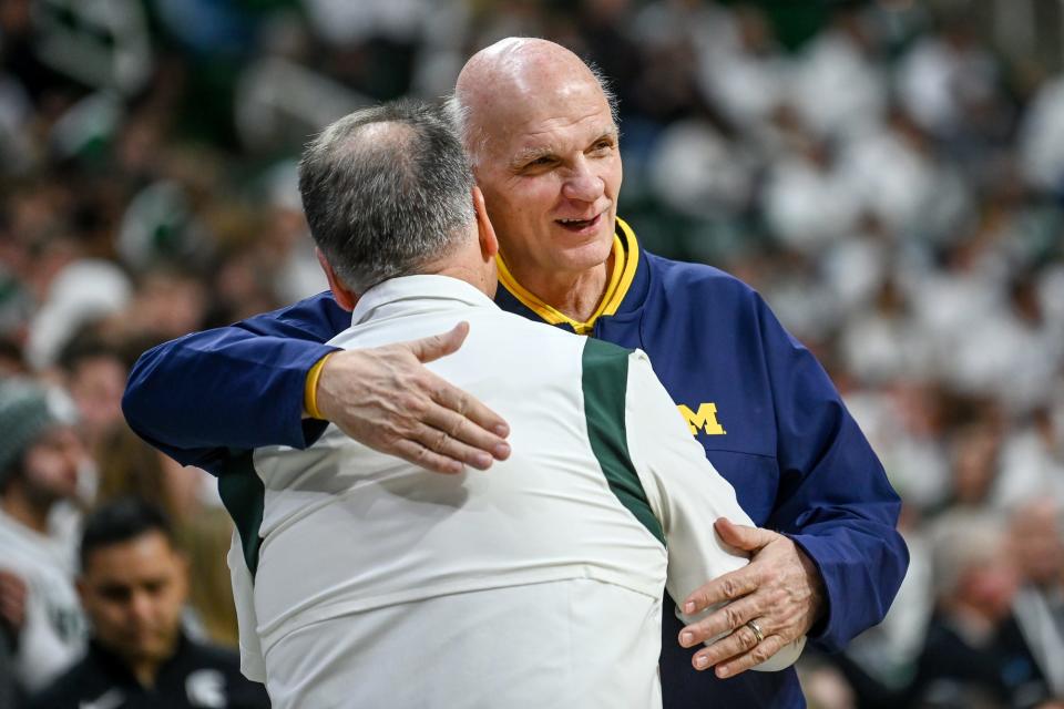 Michigan's associate coach Phil Martelli, right, hugs Michigan State head coach Tom Izzo before the game on Saturday, Jan. 7, 2023, at the Breslin Center in East Lansing.