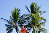 Kevin Na plays his shot from the 14th tee during the first round of the Sony Open golf tournament, Thursday, Jan. 13, 2022, at Waialae Country Club in Honolulu. (AP Photo/Matt York)