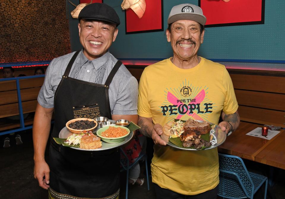 Los Angeles, USA. 23rd June, 2021. (L-R) Chef Johneric Concordia of The Park's Finest and Danny Trejo of Trejo's Tacos at the Trejo's Tacos x The Park's Finest Celebration Pop-Up Event held at Trejo's Cantina in Hollywood, CA on Wednesday, ?June 23, 2021. Part of the proceeds will be donated to El Centro Del Pueblo an organization that is close to Danny Trejo and The Park's Finest owner, Johneric Concordia, both of whom grew up in Echo Park. (Photo By Sthanlee B. Mirador/Sipa USA) Credit: Sipa US/Alamy Live News