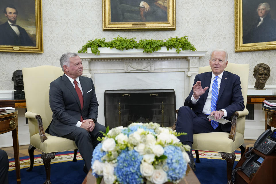 President Joe Biden, right, meets with Jordan's King Abdullah II, left, in the Oval Office of the White House in Washington, Monday, July 19, 2021. (AP Photo/Susan Walsh)