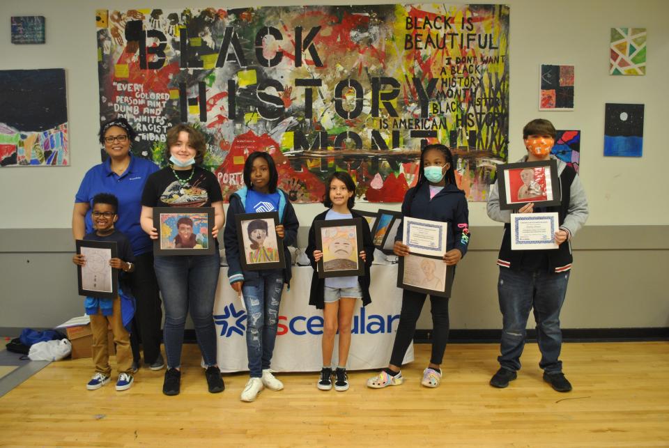 Candice Champion, Talent Brand Strategist at UScellular, poses with art contest winners from the Boys & Girls Clubs of the Tennessee Valley. March 2022