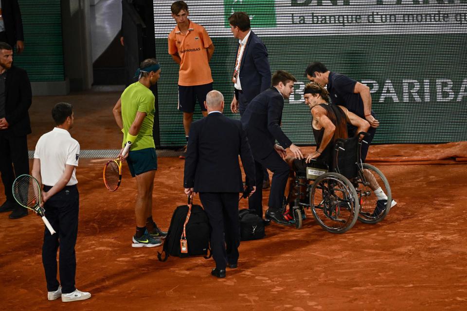 Rafa Nadal, pictured here as Alexander Zverev leaves the court in a wheelchair.