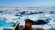 Canadian coast guard icebreaker Amundsen breaks through ice to the west of Cornwallis Island in the Canadian Arctic. Scientists from the ArcticNet research consortium, which is based at Universite Laval in Quebec City, are travelling through the Northwest Passage mapping the sea floor and studying marine life. (Photo by Alice Li/The Washington Post via Getty Images)